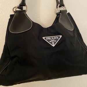 Black nylon Prada handbag (small damages)